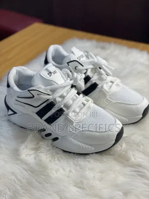 Unisex White & Black Sneakers – Casual Sports & Everyday Shoes
