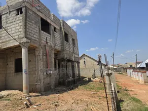 Thirty Uncompleted Bedroom Storey Building at Maase for Sale