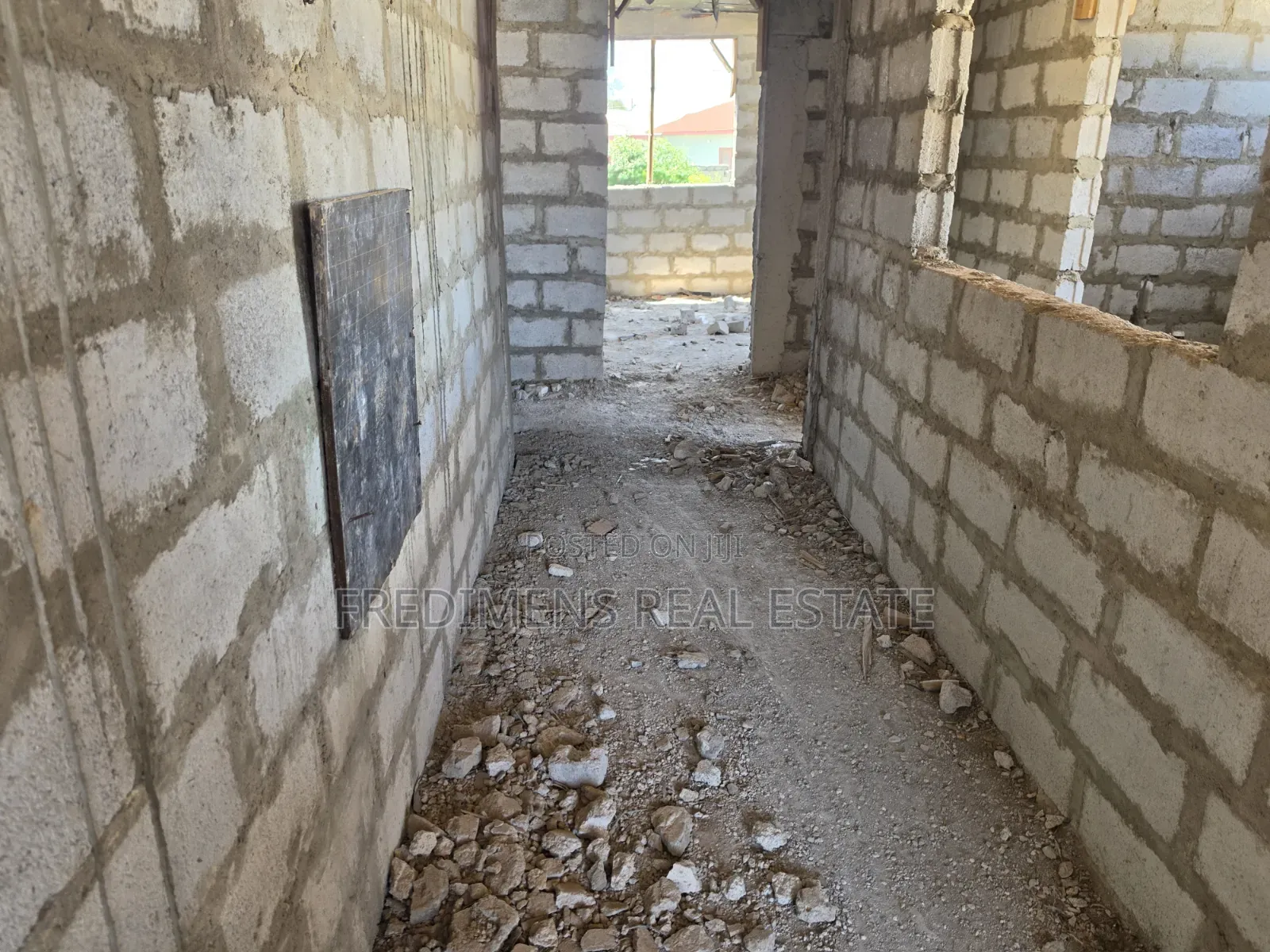 Thirty Uncompleted Bedroom Storey Building at Maase for Sale