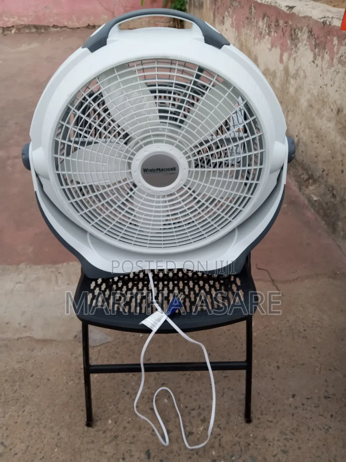 A Lasko Wind Machine 20-Inch Air Circulator Fan