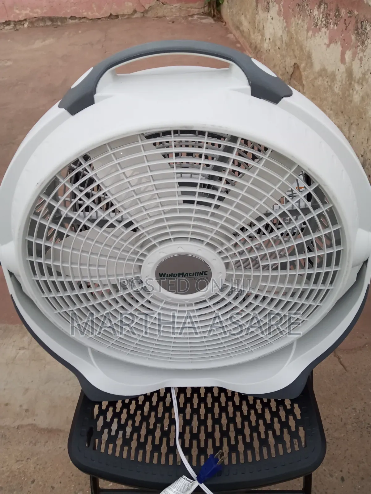 A Lasko Wind Machine 20-Inch Air Circulator Fan