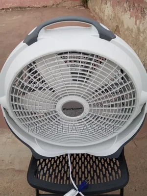 A Lasko Wind Machine 20-Inch Air Circulator Fan