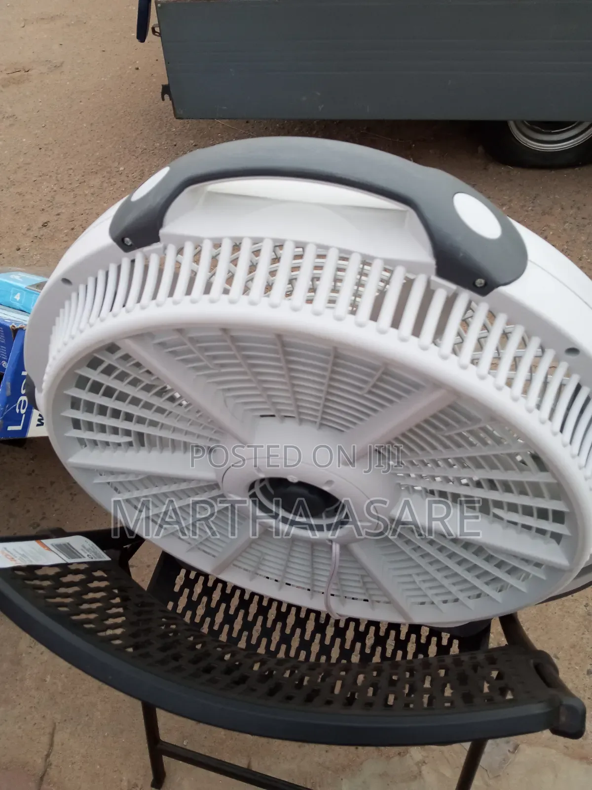 A Lasko Wind Machine 20-Inch Air Circulator Fan
