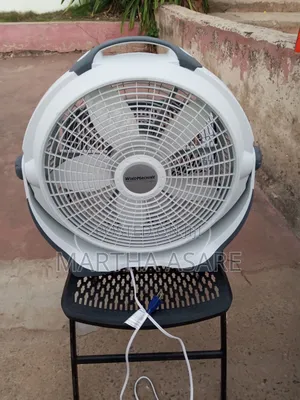 A Lasko Wind Machine 20-Inch Air Circulator Fan