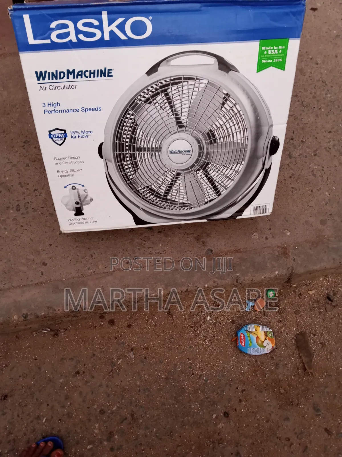 A Lasko Wind Machine 20-Inch Air Circulator Fan