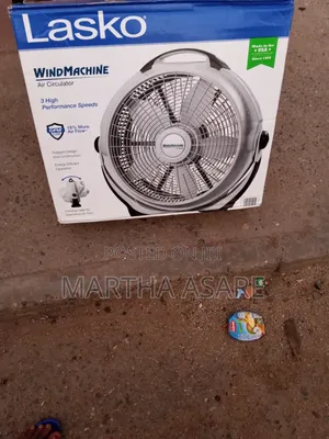 A Lasko Wind Machine 20-Inch Air Circulator Fan