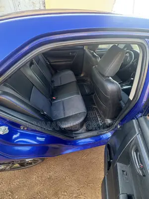 Toyota Corolla SE-blue- Sunroof Black Sport Rims for Rent in Madina