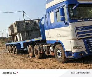 DAF XF105-510 and Trailer Going for Cool Prize