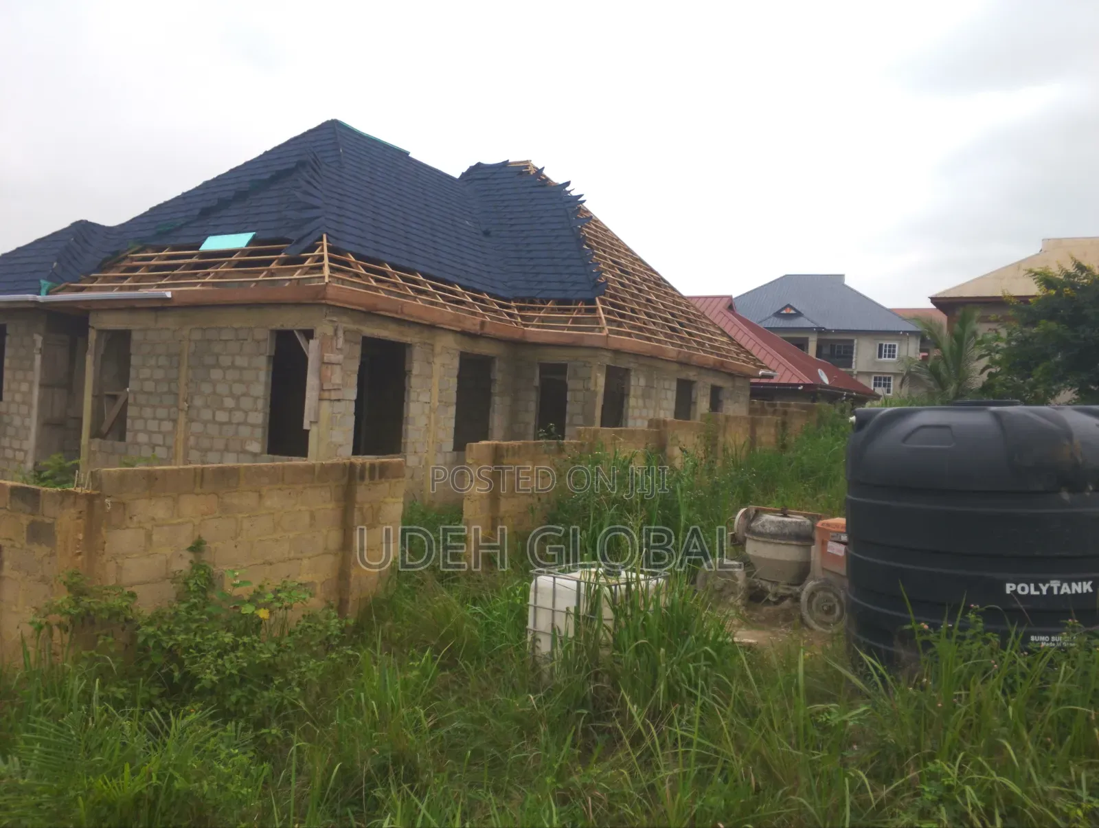 Wood Work and Euro Tile's Roofing Sheets and Rain Gutters Installation