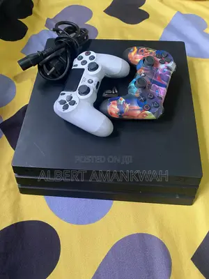 PS4 Pro 1TB With 2controllers and 8games Including FC27