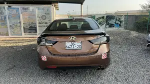 Hyundai Elantra GS Coupe FWD (1.8L 4cyl 6A) 2013 Brown