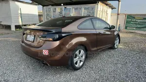 Hyundai Elantra GS Coupe FWD (1.8L 4cyl 6A) 2013 Brown