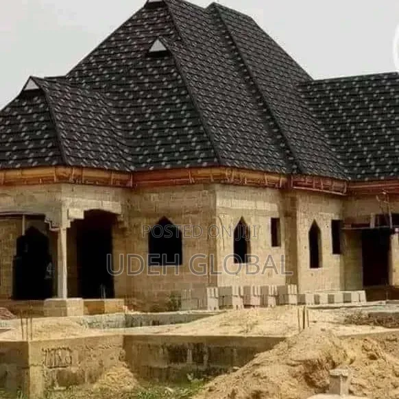 Wood Work and Euro Tile's Roofing Sheets and Rain Gutters Installation