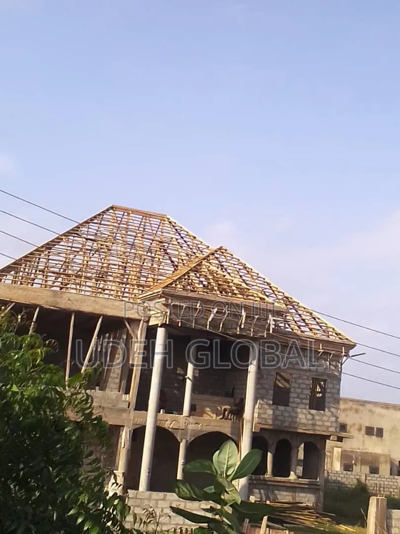 Wood Work and Euro Tile's Roofing Sheets and Rain Gutters Installation