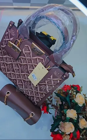 A Stylish Brown 2-in-1 Handbag With a Matching Mini Crossbody Bag