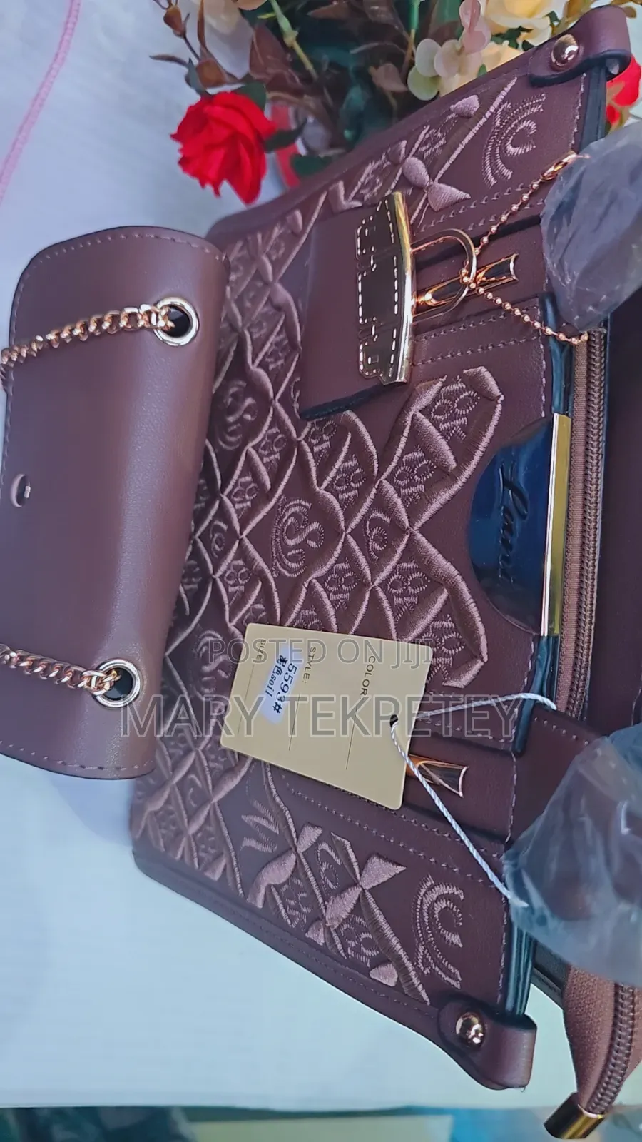 A Stylish Brown 2-in-1 Handbag With a Matching Mini Crossbody Bag