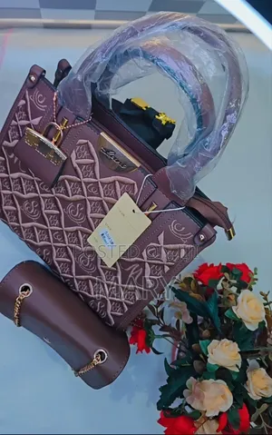 A Stylish Brown 2-in-1 Handbag With a Matching Mini Crossbody Bag