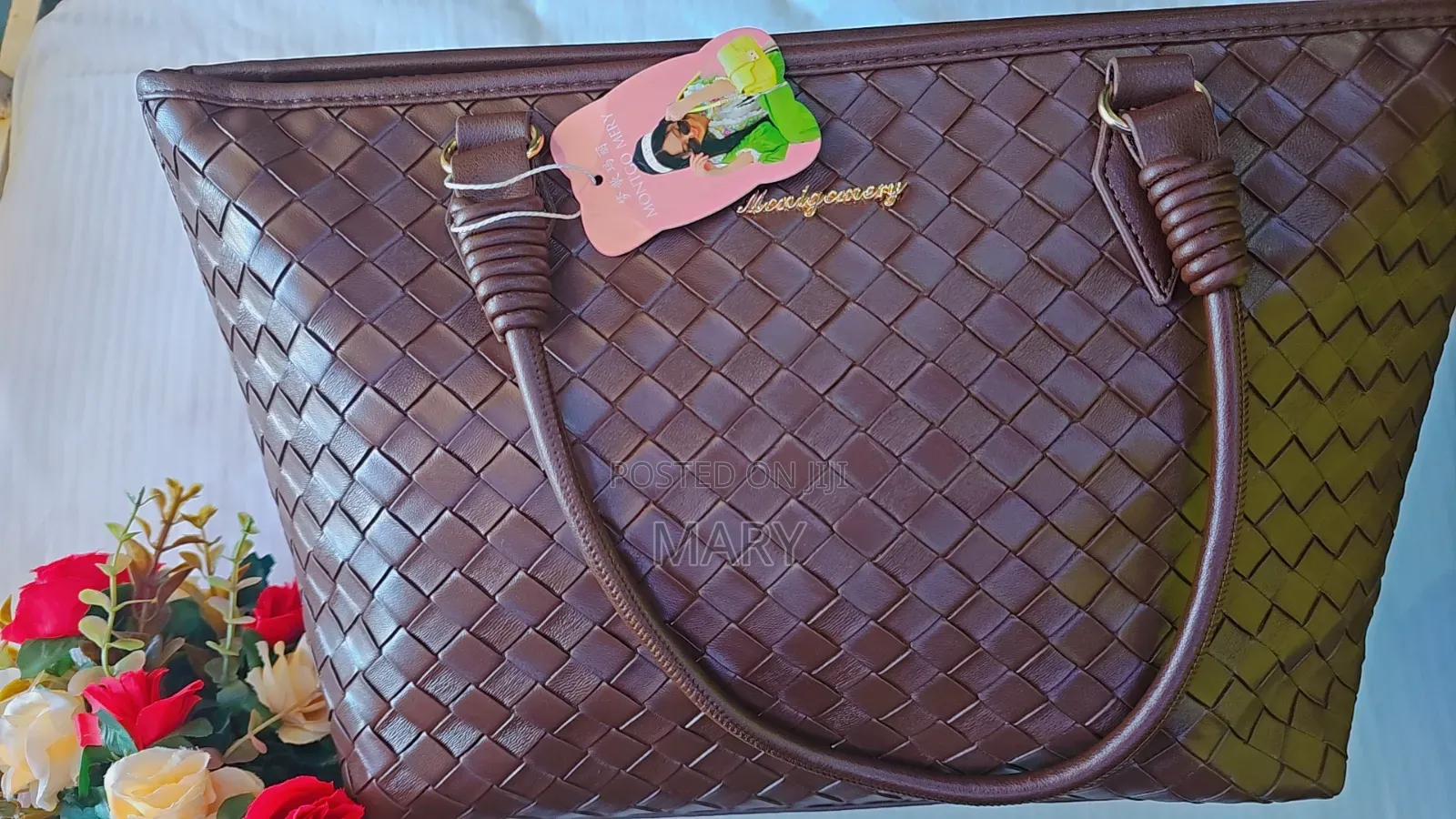 A Dark Brown Woven Leather Handbag