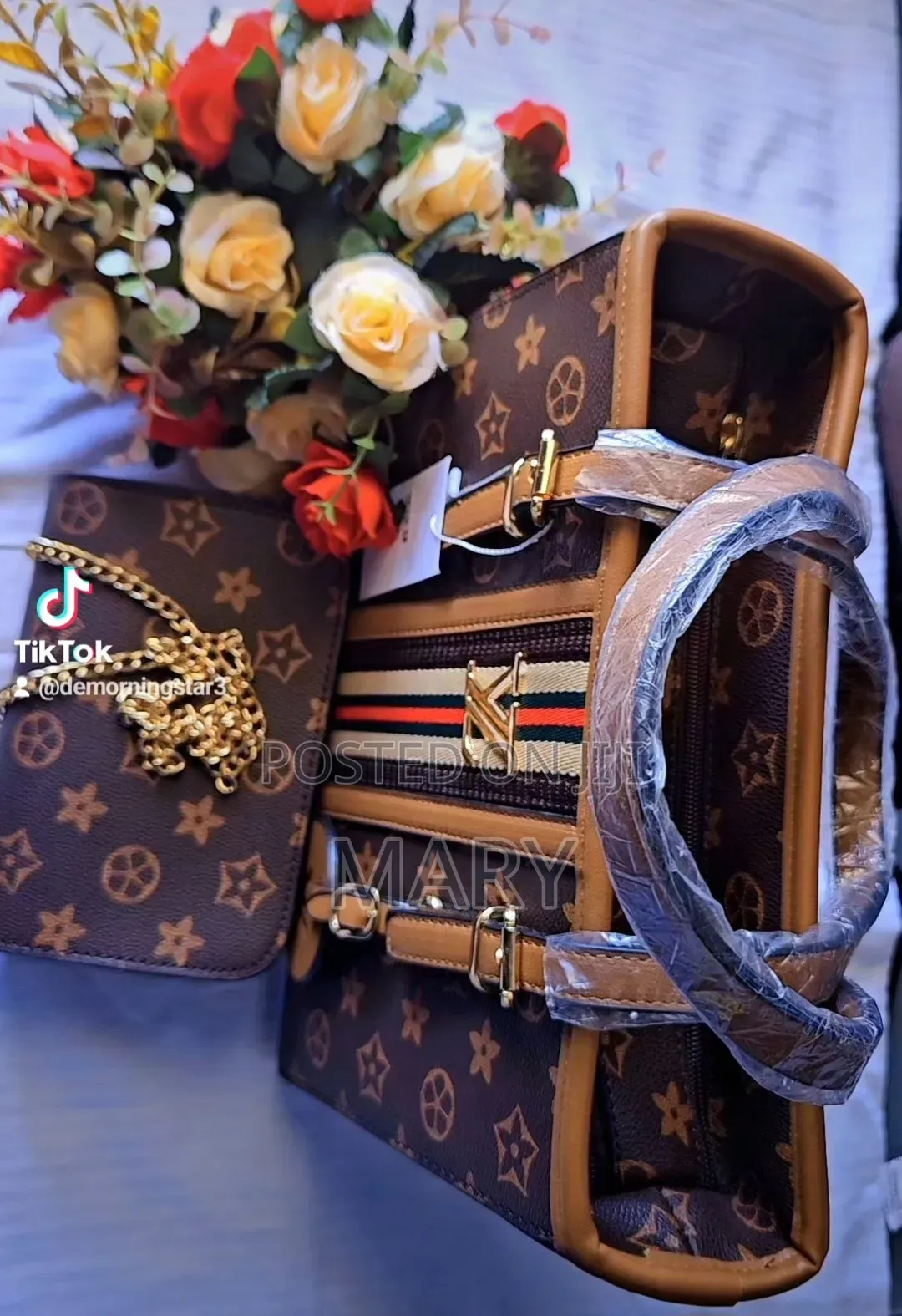A Brown Patterned Handbag Set With a Matching Mini Shoulder Bag