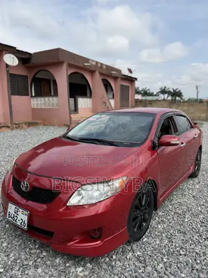 Toyota Corolla Base 4dr Sedan (1.8L 4cyl 5M) 2010 Red