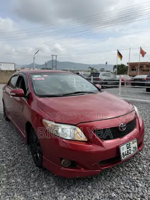Toyota Corolla Base 4dr Sedan (1.8L 4cyl 5M) 2010 Red