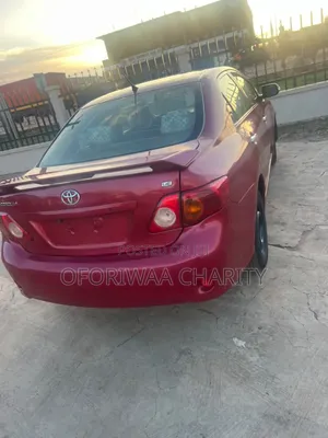 Toyota Corolla Base 4dr Sedan (1.8L 4cyl 5M) 2010 Red