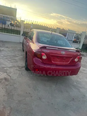 Toyota Corolla Base 4dr Sedan (1.8L 4cyl 5M) 2010 Red