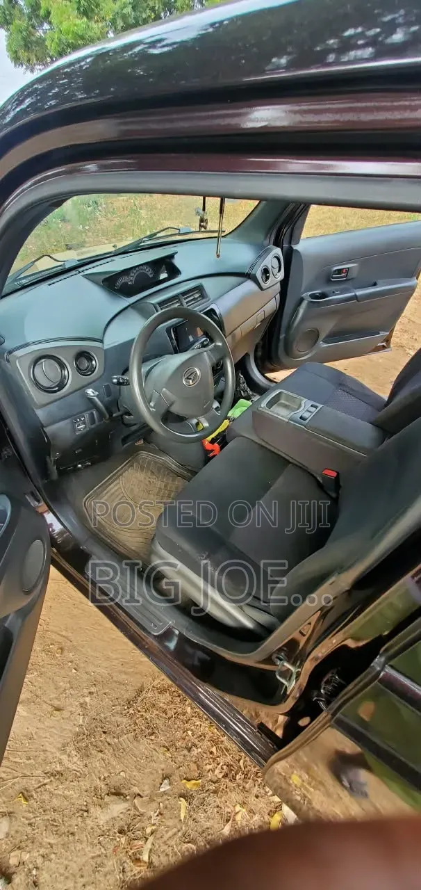 Daihatsu Cuore 2015 Brown