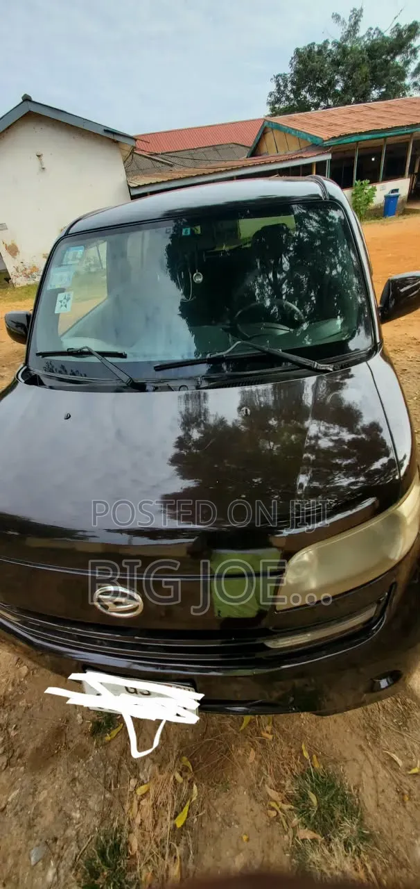 Daihatsu Cuore 2015 Brown