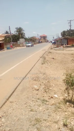 3bedroom House on 2Plot of Land by the Main Road in Amasaman Opah