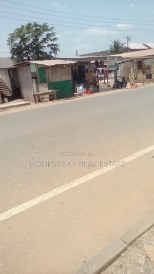 3bedroom House on 2Plot of Land by the Main Road in Amasaman Opah