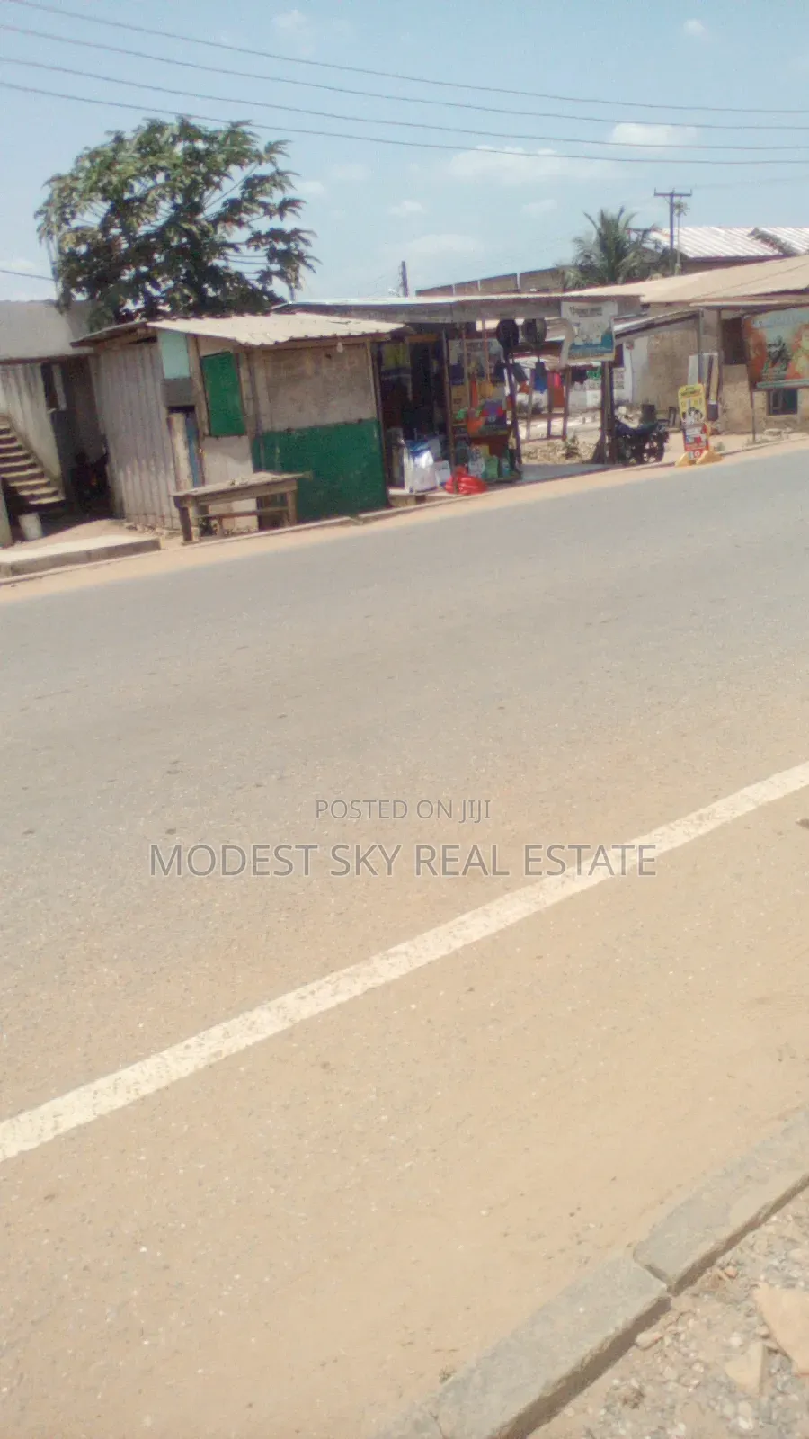 3bedroom House on 2Plot of Land by the Main Road in Amasaman Opah
