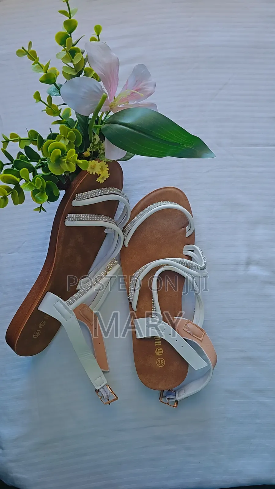 A Pair of Flat, Strappy Women's Sandals
