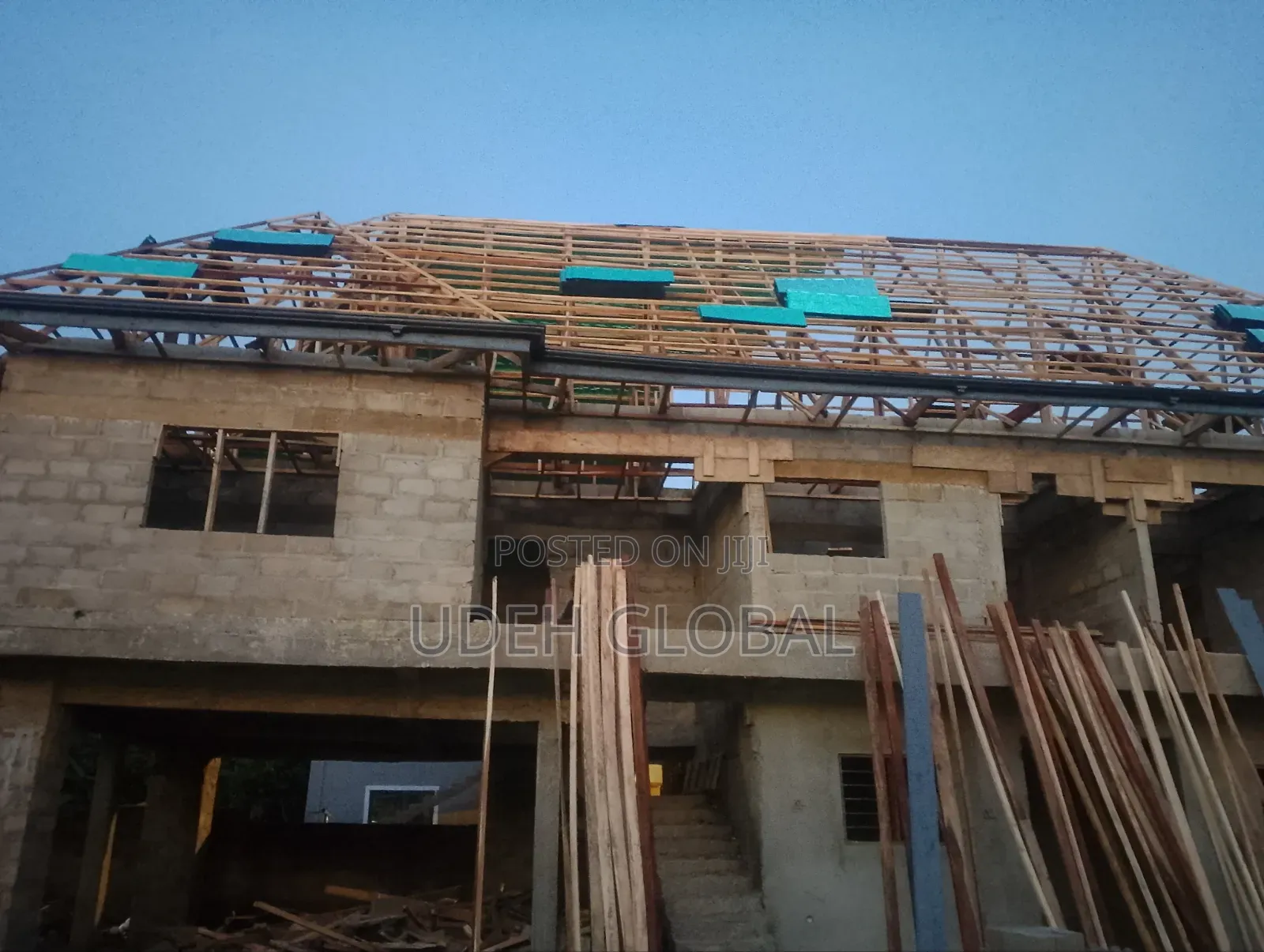 Wood Work and Euro Tile's Roofing Sheets and Rain Gutters Installation
