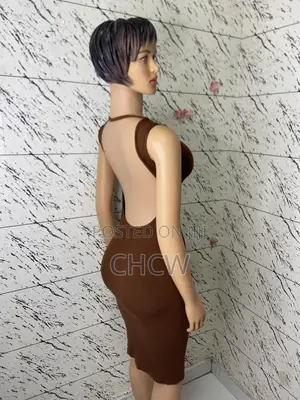 New Sexy Ladies Brown Dress and a Matching Ladies Bag Both for 100Gh
