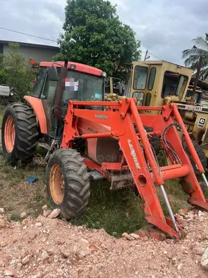 Kubota M105S 4WD Tractor With Front Loader and Wrench