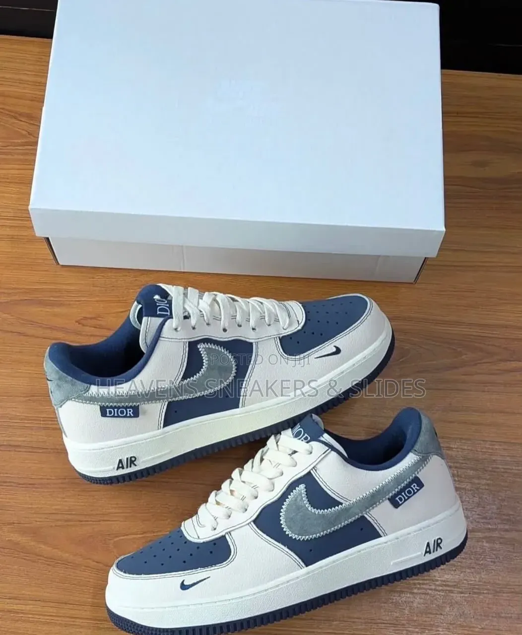 The Nike Air Force 1 X Dior Sneakers White and Navy Blue Colorway.