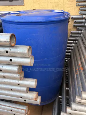 Slightly Used Blue Barrel Container (Drum) for Water Storage At