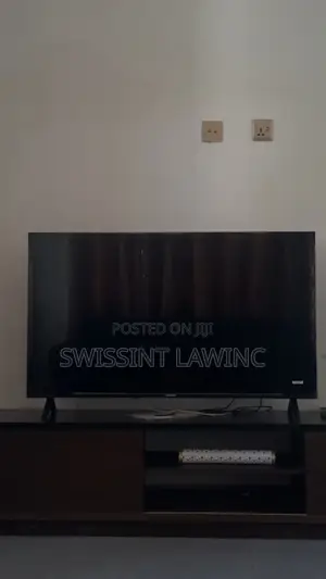 Brand New 50’ TV and Wooden Stand for Sale