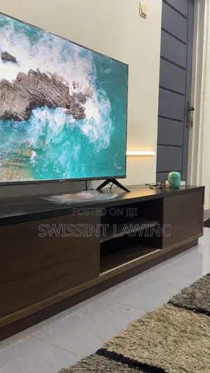 Brand New 50’ TV and Wooden Stand for Sale