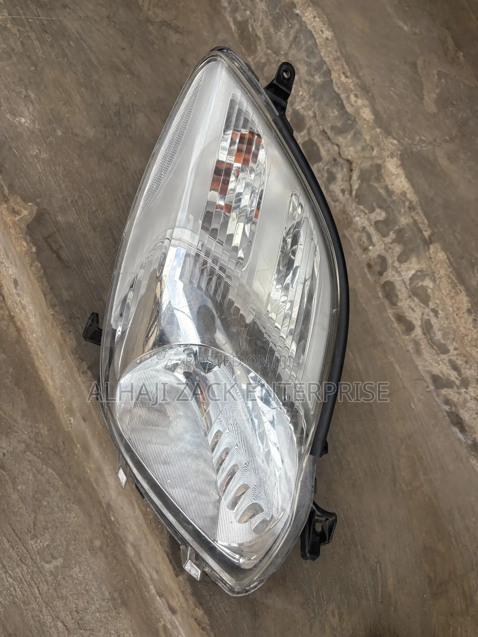 Toyota Vitz 2010 Headlight With Booster