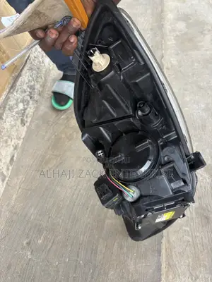 Toyota Vitz 2010 Headlight With Booster