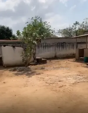 1 Plot of Land With a House