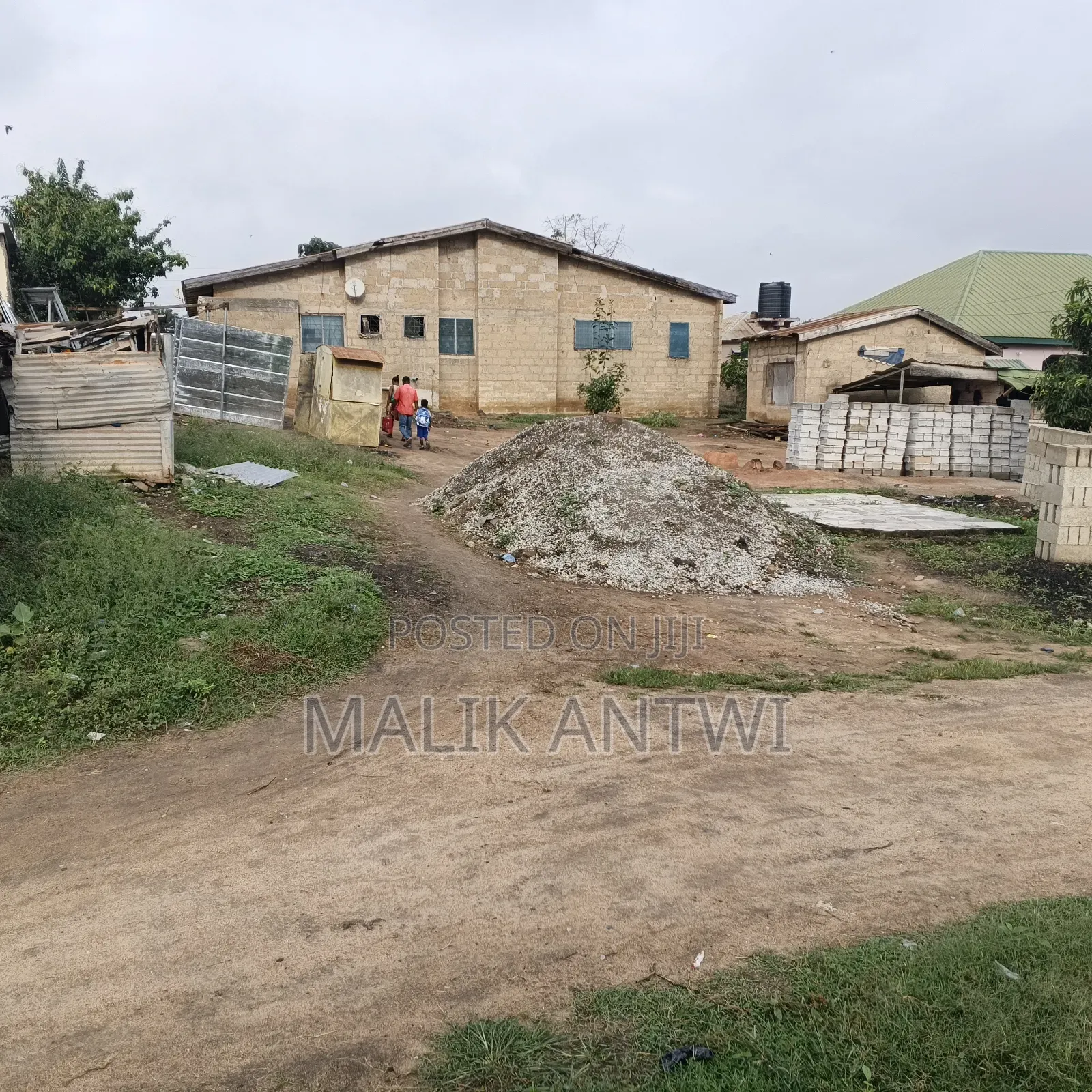 Full Plot at Aputuogya Close to Roadside for Sale