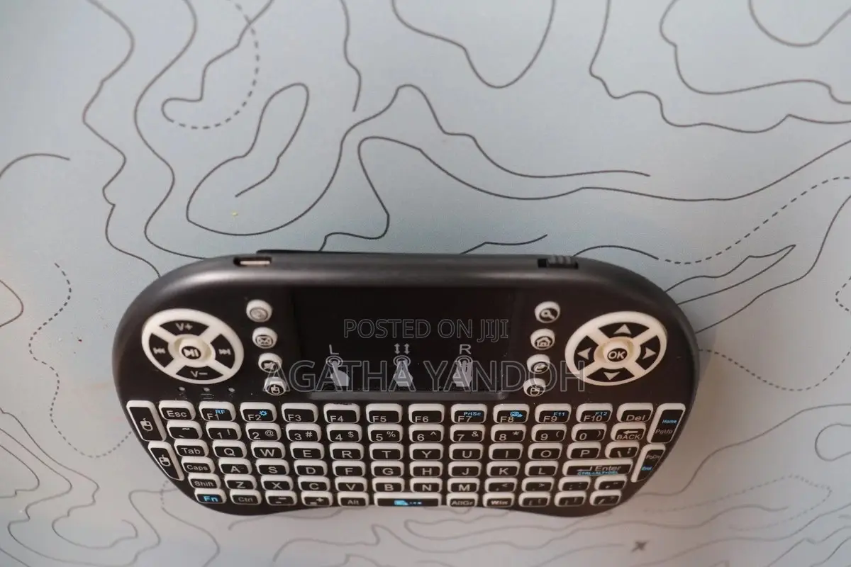 Wireless Mini Keyboard Plus Remote With Touchpad & Media Controls
