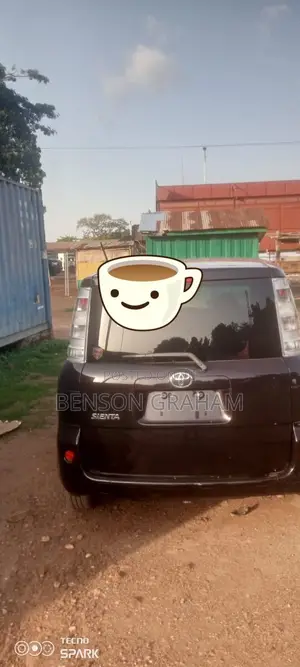 Toyota Sienta 1.5 AWD 2014 Maroon
