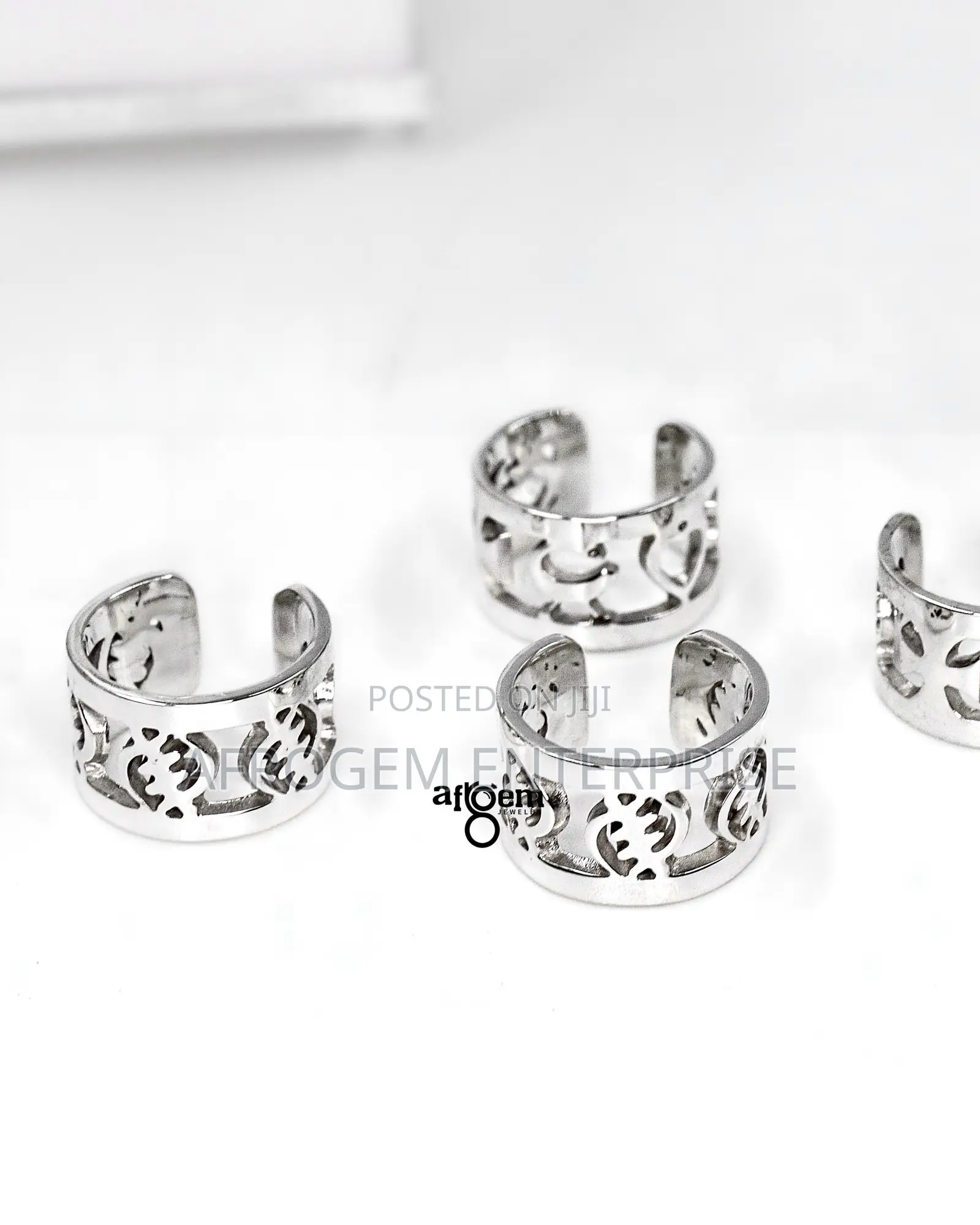 A Pair of Stylish Silver-Tone Adinkra Ear Cuff (Earrings)
