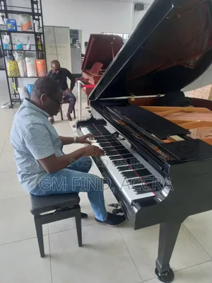 Beautiful White Acoustic Grand Piano