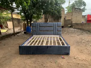 Bold Grey Velvet Bed Frame With Gold Accents