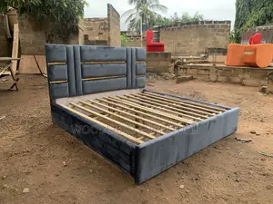 Bold Grey Velvet Bed Frame With Gold Accents